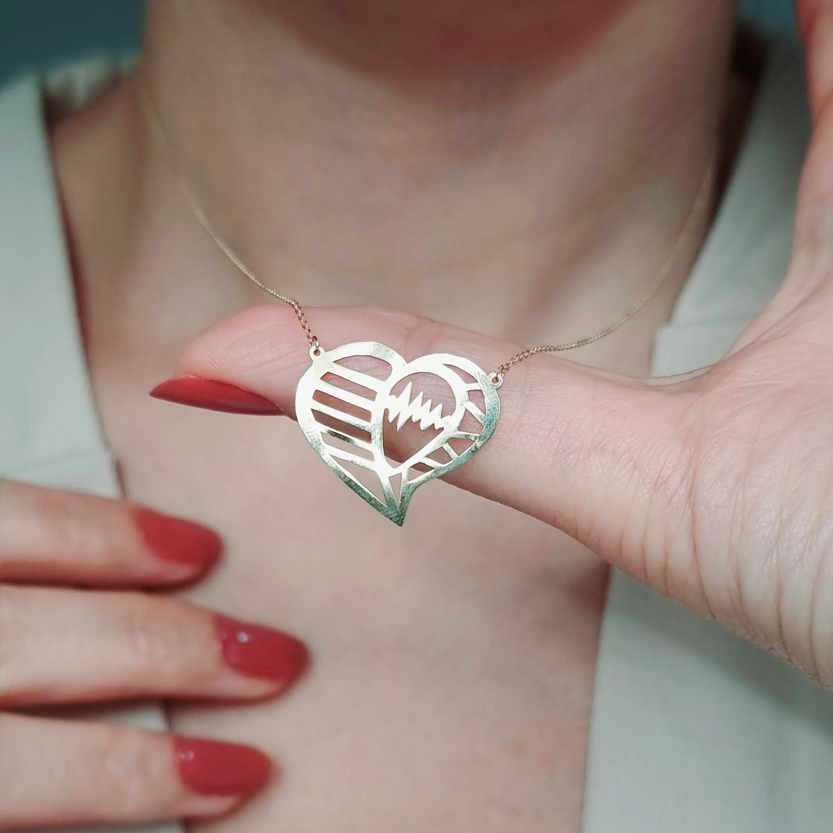 18K Pure Gold Heartbeat Necklace - Image 2